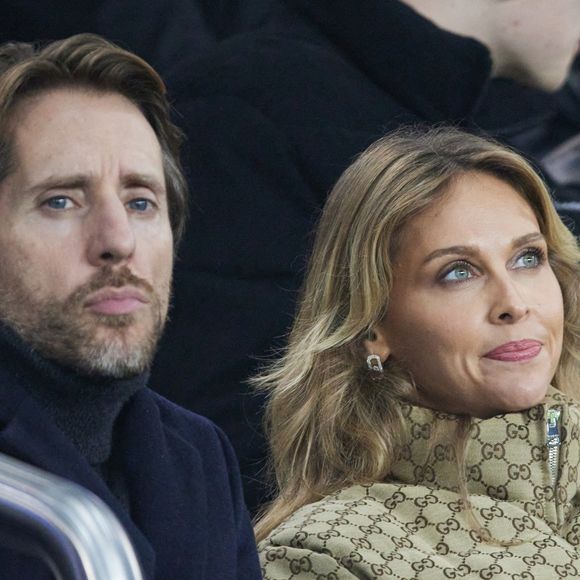Ophélie Meunier et son mari Mathieu Vergne - Célébrités assistent au match de Ligue des champions entre le PSG et Manchester City (4-2) au Parc des Princes à Paris le 22 janvier 2025. © Cyril Moreau/Bestimage