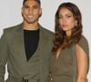 Si Achraf Hakimi brille depuis plusieurs années sur les terrains de football, la mère de ses deux fils est également une personnalité connue en Espagne. 

Achraf Hakimi et sa compagne Hiba Abouk - Séance photo du défilé de mode femme prêt-à-porter printemps-été « Balmain » à la Seine Musicale à Paris. 
© Veeren Ramsamy-Christophe Clovis / Bestimage