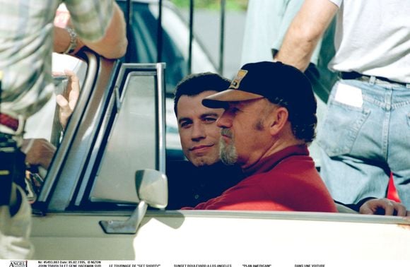 John Travolta et Gene Hackman sur le tournage de "Get Short" Sunset - Boulevard à Los Angeles - dans une voiture. 1995 (NIZON / BESTIMAGE).