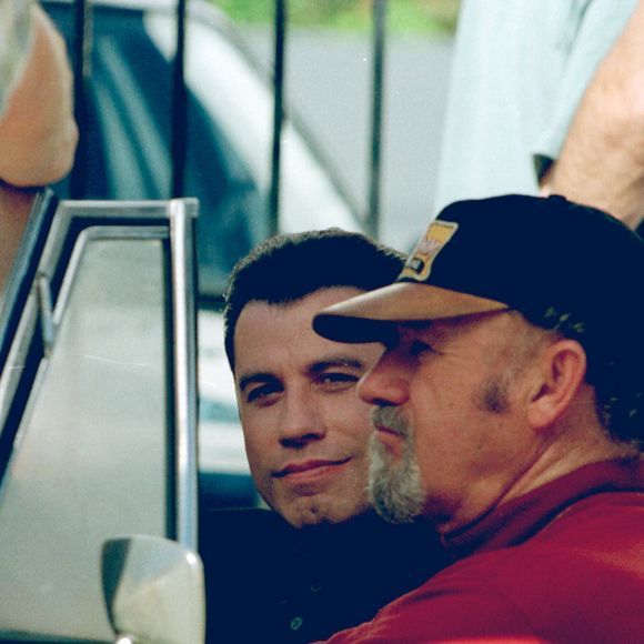 John Travolta et Gene Hackman sur le tournage de "Get Short" Sunset - Boulevard à Los Angeles - dans une voiture. 1995 (NIZON / BESTIMAGE).