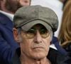 Gérard Lanvin - Célébrités dans les tribunes lors du quart de finale aller de Ligue des champions: Le PSG s'est incliné à domicile face au FC Barcelone (2-3) au Parc des Princes à Paris le 10 avril 2024. © Cyril Moreau/Bestimage