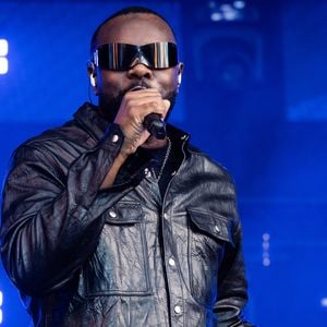 Gandhi Djuna, de son vrai nom, est actuellement entendu par des juges d'instruction.

Gims, Fête de l'Humanité 2025 sur la base 217 au Plessis-Paté le 14 septembre 2025.

© Julien Sarkissian / Bestimage