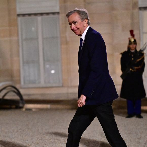 Bernard Arnault et sa femme Hélène Mercier au dîner d'état donné en l'honneur du président de l'Ouzbékistan au palais présidentiel de l'Elysée, à Paris, France, le 12 mars 2025. © Christian Liewig/Bestimage