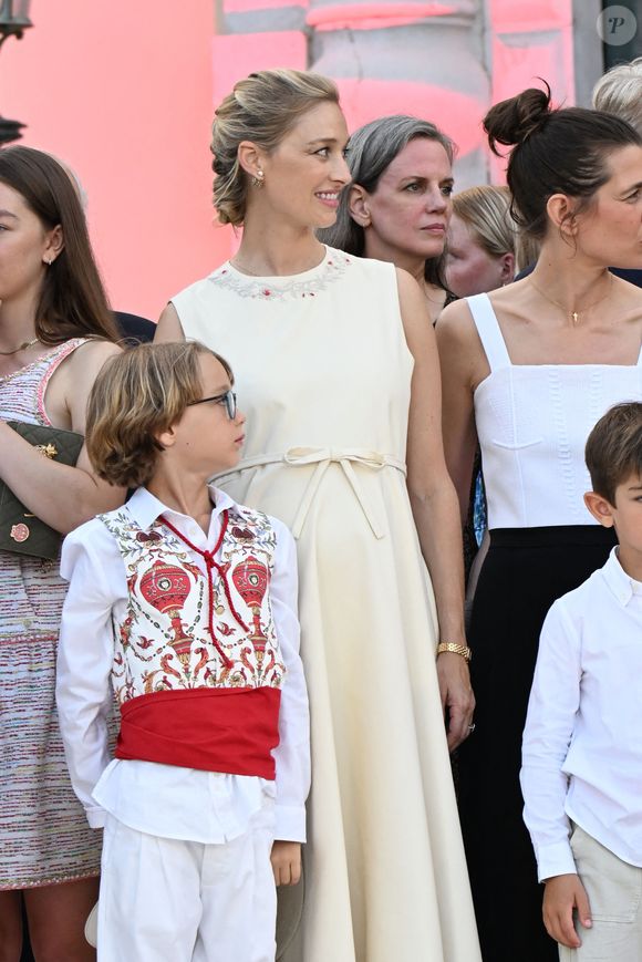 Francesco Carlo Albert Casiraghi et Beatrice Borromeo à la célébration des 20 ans de règne d'Albert II de Monaco sur la place du Palais à Monaco, le 19 juillet 2025. 

Photo : Bruno Bebert / Bestimage