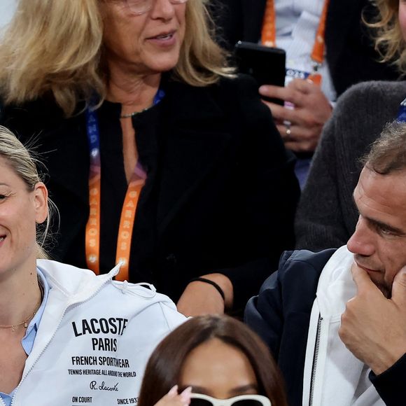 Laure Boulleau et Bruno Cheyrou dans les tribunes lors des Internationaux de France de Tennis de Roland Garros 2025, à Paris, France, le 28 mai 2025. © Jacovides-Moreau/Bestimage