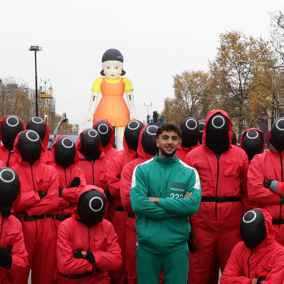 Inoxtag  - La plus belle avenue du monde va célébrer la sortie de la saison 2 de Squid Game en revisitant l'une de ses épreuves mythiques, 1,2,3 Soleil, à laquelle participeront 423 heureux volontaires dont les influenceurs Inoxtag, Maghla, Nicotine et Just Riadh sur l'Avenue des Champs-Élysées, à Paris, rRance, le 1er décembre 2024. © Coadic Guirec/Bestimage
