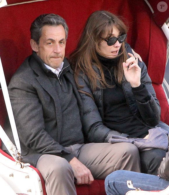 L'ancien président français Nicolas Sarkozy avec sa femme chanteuse Carla Bruni et leur fille Giulia sont aperçus en train de faire une promenade en calèche dans Central Park à New York City, NY, USA le 23 avril 2014. Photo by Dessalles-Guerin/ABACAPRESS.COM