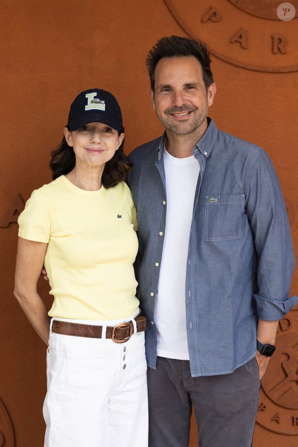 Christophe Michalak et Delphine McCarty au Village lors des Internationaux de France de Tennis de Roland Garros 2025 (Jour 9), le 3 juin 2025 à Paris. 
© Moreau / Jacovides / Bestimage