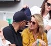 "Un couple n’a pas besoin d’avoir les mêmes goûts en matière de décoration, mais il faut se comprendre."
Roschdy Zem et sa compagne Sarah Lavoine en tribunes des Internationaux de France de tennis de Roland Garros 2023 à Paris le 11 juin 2023. © Jacovides-Moreau/Bestimage