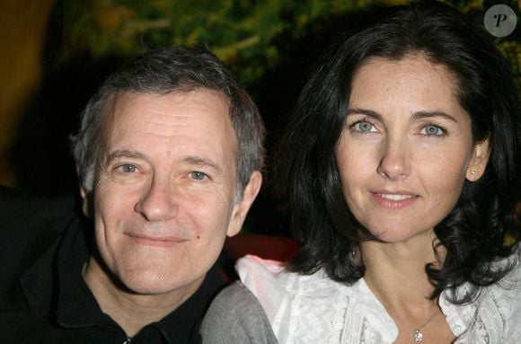 L'acteur français Francis Huster et son épouse Cristiana Reali lors d'une soirée pour annoncer une journée spéciale avant la Foire du Trone au profit de la 'Fondation Alfred Fournier' au Banana Café à Paris le 19 mars 2007 Photo by Denis Guignebourg/ABACAPRESS.COM