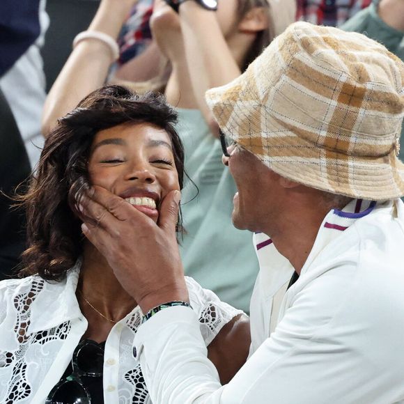 Naissance - Yannick Noah est papa pour la 6e fois d'une petite fille prénommée Keelaani - Yannick Noah et sa compagne Malika - Les célébrités en tribunes pendant l'épreuve de basketball de Demi-Finale opposant la France à l'Allemagne lors des Jeux Olympiques de Paris 2024 (JO) à l'Arena Bercy, à Paris, France, le 8 août 2024. © Jacovides-Perusseau/Bestimage