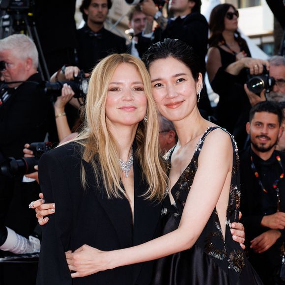 Virginie Efira, Tao Okamoto - Montée des marches pour la cérémonie de clôture du 79ème Festival International du Film de Cannes, le 23 mai 2026. © Jacovides-Moreau / Bestimage