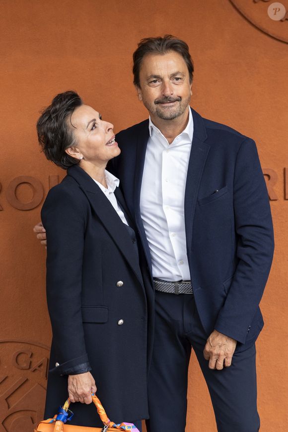 Henri Leconte et sa compagne Maria Dowlatshahi au village lors des Internationaux de France de Tennis de Roland Garros 2025. Paris, le 27 mai 2025. 
© Moreau / Jacovides / Bestimage
