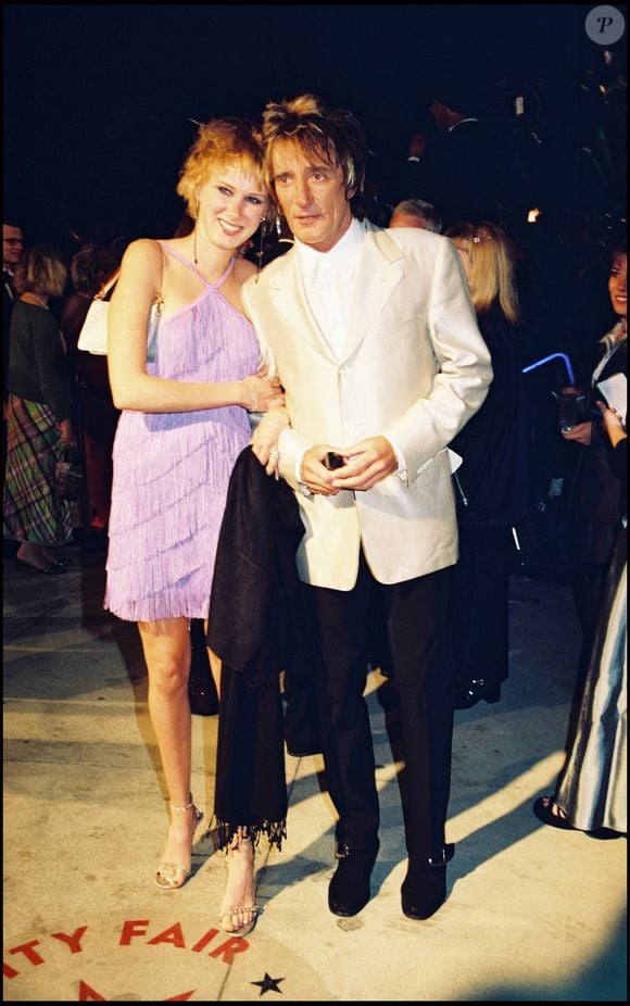 Rod Stewart et sa femme à la soirée Vanity Fair à Los Angeles en 2000 / ALAIN ROLLAND / MAXIMA PROD / BESTIMAGE