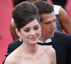 Installés à Paris, ils ont toujours cultivé une vie de famille préservée, organisant leur quotidien de façon à ne jamais être éloignés trop longtemps de leurs enfants Louise et Marcel

Marion Cotillard et Guillaume Canet - Montee des marches du film "Blood Ties" lors du 66 eme Festival du film de Cannes - Cannes 20/05/2013 BORDE-MOREAU / BESTIMAGE