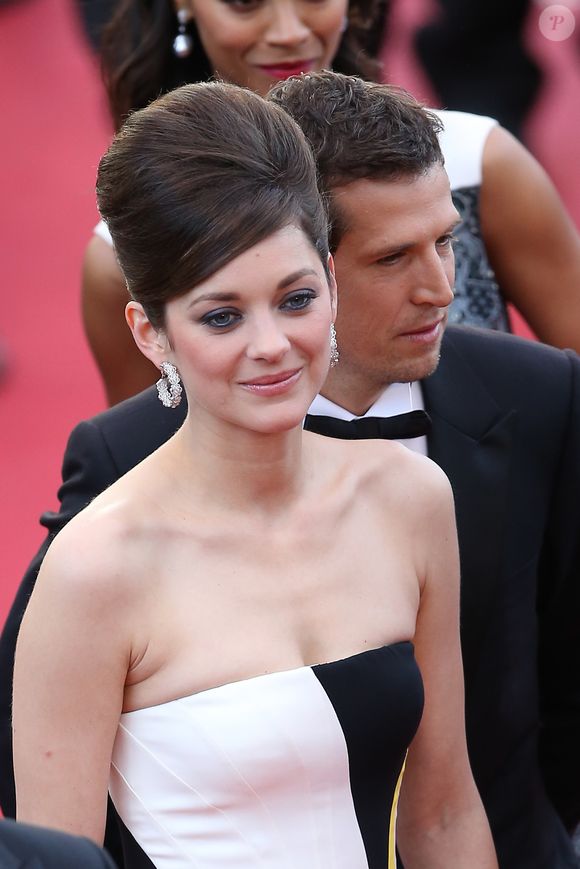 Installés à Paris, ils ont toujours cultivé une vie de famille préservée, organisant leur quotidien de façon à ne jamais être éloignés trop longtemps de leurs enfants Louise et Marcel

Marion Cotillard et Guillaume Canet - Montee des marches du film "Blood Ties" lors du 66 eme Festival du film de Cannes - Cannes 20/05/2013 BORDE-MOREAU / BESTIMAGE
