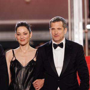Marion Cotillard et Guillaume Canet - Descente des marches du film « Karma » lors du 79ème Festival International du Film de Cannes, le 15 mai 2026. © Jacovides-Moreau / Bestimage