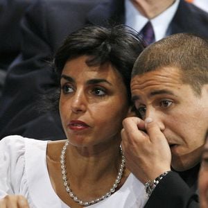 "Rachida Dati et le chanteur Faudel écoutent le candidat à la présidence Nicolas Sarkozy s'adresser à des dizaines de milliers de partisans à la salle de concert de Paris Bercy à Paris, France, le 29 avril 2007. Photo By Bisson-Taamallah-Orban/ABACAPRESS.COM"