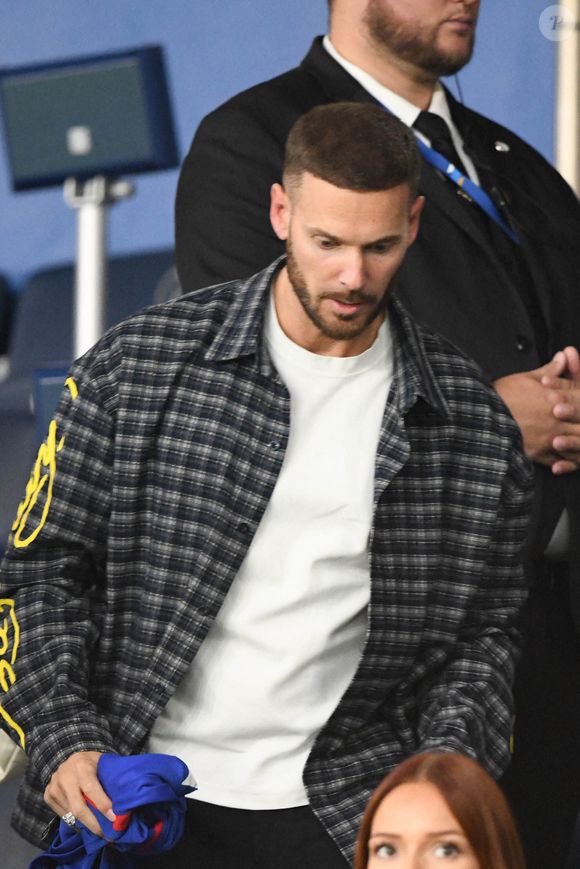 M Pokora et sa compagne Christina Milian au Parc des Princes lors du match de qualification pour la Coupe du monde entre la France et l'Islande. Paris, France, 9 septembre 2025. Photo by Florian Poitout/ABACAPRESS.COM