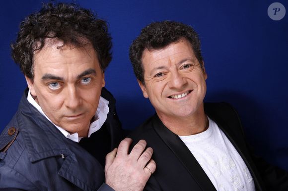 Eric Carriere et Francis Ginibre des Chevaliers Du Fiel posant lors d'une séance photo à Paris, France, en mars 2014. Photo par VIM/ABACAPRESS.COM