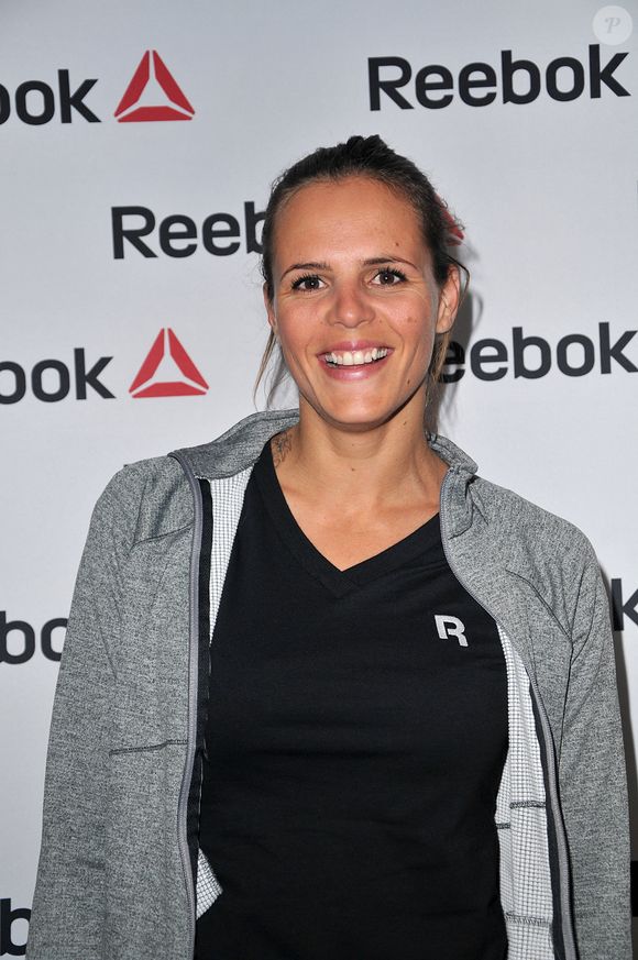 Laure Manaudou participe à l'événement d'ouverture du Concept Store Reebok à l'Avenue de L'Opéra à Paris, France, le 4 décembre 2013. Photo par Thierry Plessis/ABACAPRESS.COM