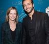 Le gérant les a filmés en train de signer la statue qui sert de livre d’or à l’établissement.

Maxim Nucci (Yodelice) et sa compagne Isabelle Ithurburu - Soirée de la Nuit de la Beauté à l’institut Carlota avec O.P.I et System Professional à Paris le 1er février 2018.
 © Cyril Moreau/Bestimage