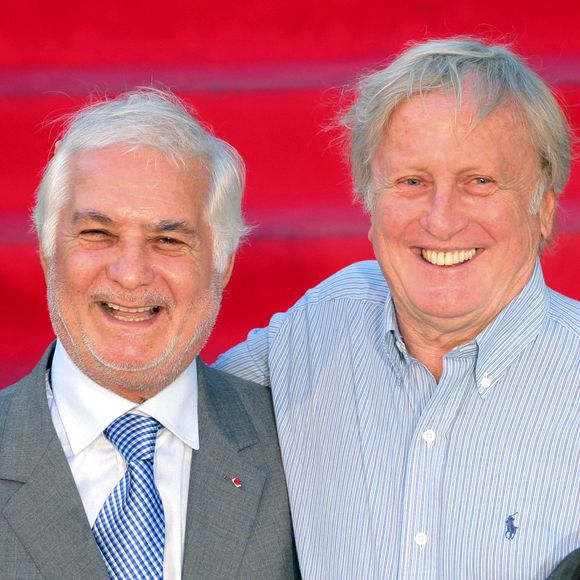 Jean-Claude Brialy et Claude Rich posent lors d'un photocall au 7ème Festival de la fiction TV à Saint-Tropez, France, le 17 septembre 2005. Photo par Gerald Holubowicz/ABACAPRESS.COM