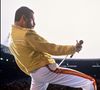 "Freddie Mercury était et il est mon père", indique-t-elle, ajoutant qu'ils avaient "une relation très fusionnelle et très aimante".

Freddie Mercury et Queen en concert au stade Wembley à Londres, en 1986.