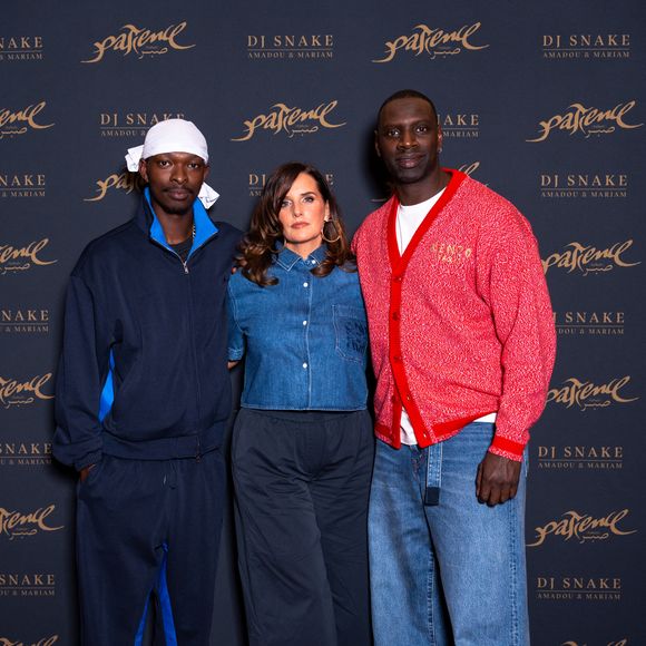 Alassane Diong, Helene Sy et Omar Sy à la présentation du court métragede DJ Snake "Patience", sample de "Sabali" de Amadou & Mariam au Grand Rex à Paris en soutien à SOS Méditerranée autour du thème de la migration, de l'exil et de la résilience, le 3 juin 2025
© Pierre Perusseau / Bestimage
