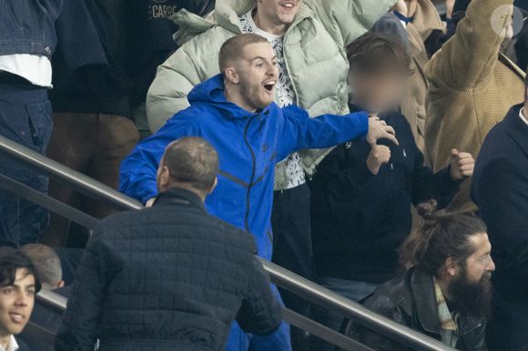 Le youtubeur Michou - Célébrités des les tribunes lors du match aller du quart de finale de Ligue des champions entre le PSG et Aston Villa (3-1) au Parc des Princes à Paris le 9 avril 2025. © Cyril Moreau/Bestimage