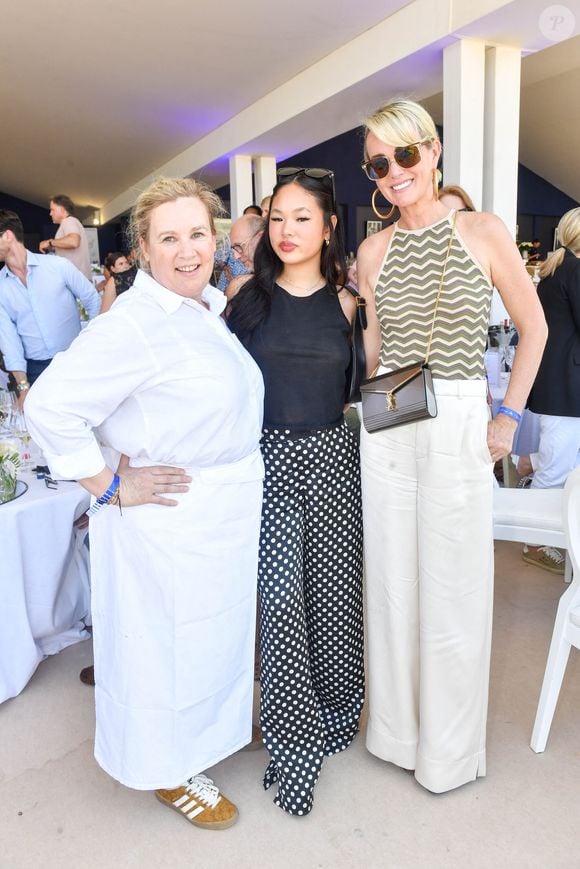 Exclusif - La cheffe Hélène Darroze, Laeticia Hallyday et sa fille Joy dans l'Espace VIP lors de la 9ème édition du "Longines Paris Eiffel Jumping" au Champ de Mars à Paris, France, le 25 juin 2023. © Perusseau-Veeren/Bestimage