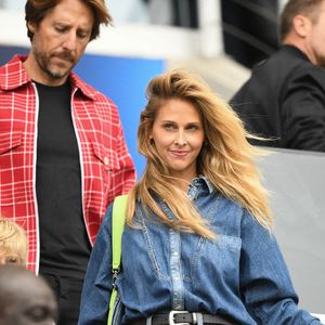 Ophelie Meunier avec son fils et Mathieu Vergne au match de football du Paris FC avec ses enfants et son mari, 31 août 2025. Photo by Florian Poitout/ABACAPRESS.COM