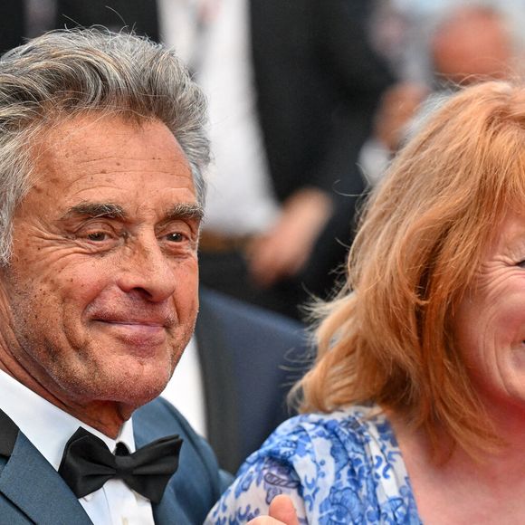 Gerard Holtz et Muriel Mayette Holtz lors du 75ème Festival de Cannes à Cannes, France, le 27 mai 2022. 
Photo : Julien Reynaud/APS-Medias/ABACAPRESSS.COM