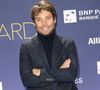 En plus de remplacer Sonia Devillers dès la prochaine saison, il continuera à officier sur BFMTV.

Benjamin Duhamel - à la 19ème édition des "BFM Awards" à la Pyramide du Louvre, le 5 décembre 2023.

Photo : Coadic Guirec/Bestimage