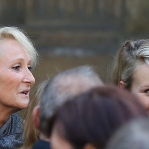 Marion Maréchal-Le Pen et sa mère Yann Le Pen aux obsèques de Roger Auque en l'église Saint-Germain-des-Près à Paris le 12 septembre 2014.