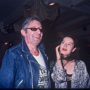 ARCHIVES - SERGE GAINSBOURG ET BAMBOU LORS D' UNE SOIREE AU PALACE A PARIS EN 1988