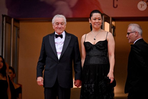 De 35 ans sa cadette et mère de sa petite dernière, Gia, née le 6 avril 2023 et présente d'ailleurs ce soir avec ses parents

Robert de Niro, Tiffany Chen à la cérémonie d'ouverture du 78ème Festival de Cannes à Cannes, France, le 13 mai 2025. Photo par Julien Reynaud/APS-Medias/ABACAPRESS.COM