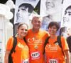 Son clan : ses parents et sa soeur Leslie ont alors créé une association pour lui rendre hommage et continuer de porter haut et fort son combat contre la maladie...

Laurence et Pierre Lemarchal et leur fille Leslie à la course des héros au parc de Saint-Cloud, le 22 juin 2014. Crédit Julien Sarkissian / Bestimage