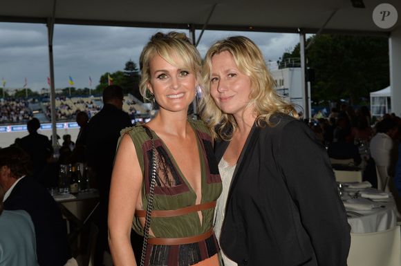 Exclusif  - Laeticia Hallyday et Luana Belmondo - Soirée au profit de l'Association "La Bonne étoile" de Laeticia Hallyday lors du 3ème Longines Paris Eiffel Jumping à la plaine de Jeux de Bagatelle à Paris le 1er juillet 2016 dans le Pavillon Eiffel du Longines Paris Eiffel Jumping décoré par Luxury Living.
© Olivier Borde / Veeren / Bestimage