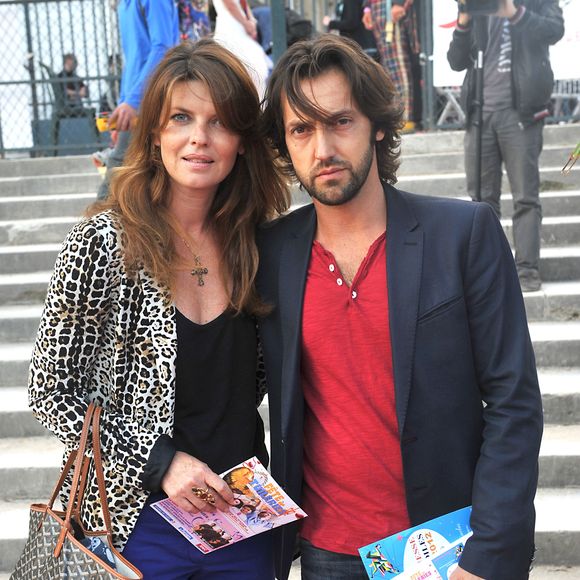 Frédéric Diefenthal et sa femme Gwendoline Hamon lors de la Kermesse aux étoiles 2012, dans le cadre de la fête foraine des Tuileries à Paris, le 22 juin 2012. VEEREN / BESTIMAGE