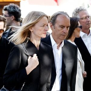 Delphine Arnault et son compagnon Xavier Niel - Arrivées aux obsèques de Nicolas Altmayer en l’Église de Saint-Germain-des-Prés à Paris le 31 aout 2026. © Dominique Jacovides-Cyril Moreau/Bestimage