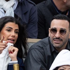 Louana Franco, Adil Rami en tribune lors des Internationaux de France 2025 à Roland Garros le 07 juin 2025 à Paris, France. Photo par Nasser Berzane/ABACAPRESS.COM