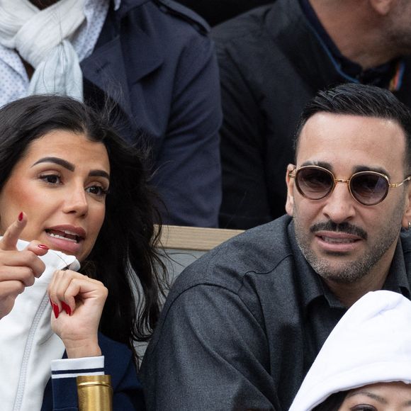 Louana Franco, Adil Rami en tribune lors des Internationaux de France 2025 à Roland Garros le 07 juin 2025 à Paris, France. Photo par Nasser Berzane/ABACAPRESS.COM