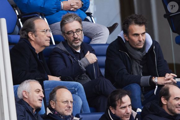Xavier Niel, Pierre-Antoine Capton, Yannick Bolloré assistent à la victoire du Paris FC face au club Red Star (4 - 1 / L2), le 25 janvier 2025.  © Cyril Moreau / Bestimage