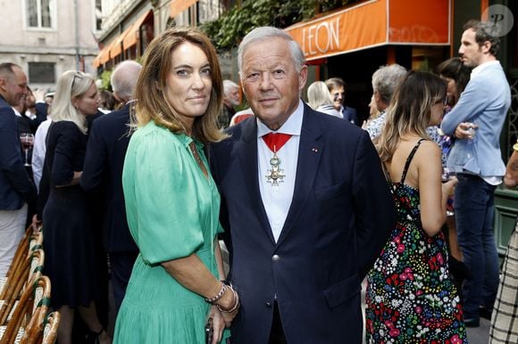 Le chef étoilé Georges Blanc avec sa compagne Sara - Laurent Gerra reçoit les insignes de Chevalier dans l’ordre du Mérite Agricole des mains de Monsieur Georges Blanc, chef triplement étoilé, au Restaurant Léon de Lyon à Lyon, France, le 3 septembre 2023. © Pascal Fayolle/Bestimage