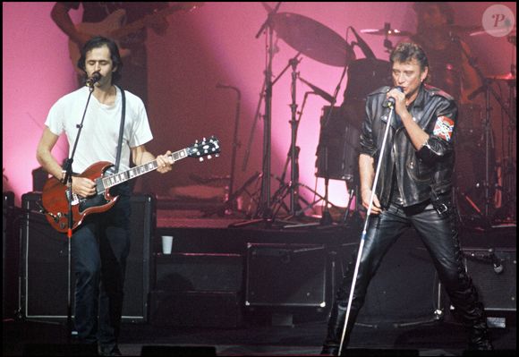 (archive) Jean-Jacques Goldman et Johnny Hallyday lors d'un concert pour la tournée des Enfoirés
©AGENCE / BESTIMAGE