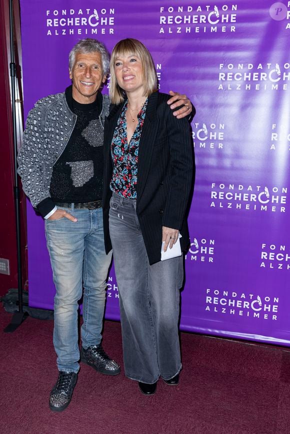 Mélanie Page a eu trois enfants avec son mari Nagui mais elle a toujours gardé un lien très fort avec Nina, la première fille de l'animateur : "Nous avons tissé une relation de confiance. Un lien très fort"
Nagui et sa femme Mélanie Page au photocall de la soirée de gala de la Fondation Recherche Alzheimer- Paris 2026 à l'Olympia le 30 mars 2026.
© Borde / Rindoff / Bestimage