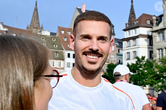 Le chanteur Matt Pokora assiste au relais de la flamme olympique à Strasbourg, dans le nord-est de la France, le 26 juin 2024. Photo par Nicolas Roses/ABACAPRESS.COM