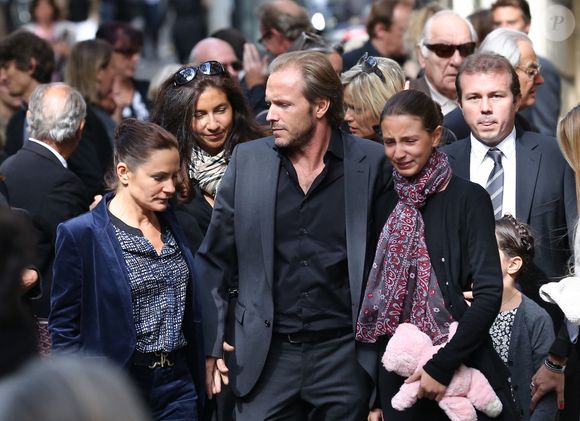 Anne, Laurent et Rebecca - Obsèques de Pierre Mondy à Paris, le 20 septembre 2012.
Bestimage