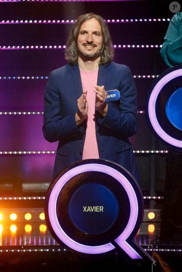 Samedi 12 juillet 2025, TF1 diffusait en prime-time une édition spéciale des "12 Coups de Midi" durant laquelle Xavier a remporté la victoire face à Émilien lors d'un duel spécial "Combat des Maîtres".

Exclusif - Xavier (Les 12 coups de midi) - Enregistrement de l'émission "Le Quiz des Champions" aux Studios 130 à Saint-Denis, présentée par C.Féraud et diffusée le 1er février 2025 sur France 2, à Paris, France, le 5 juin 2024. © Christophe Clovis/Bestimage